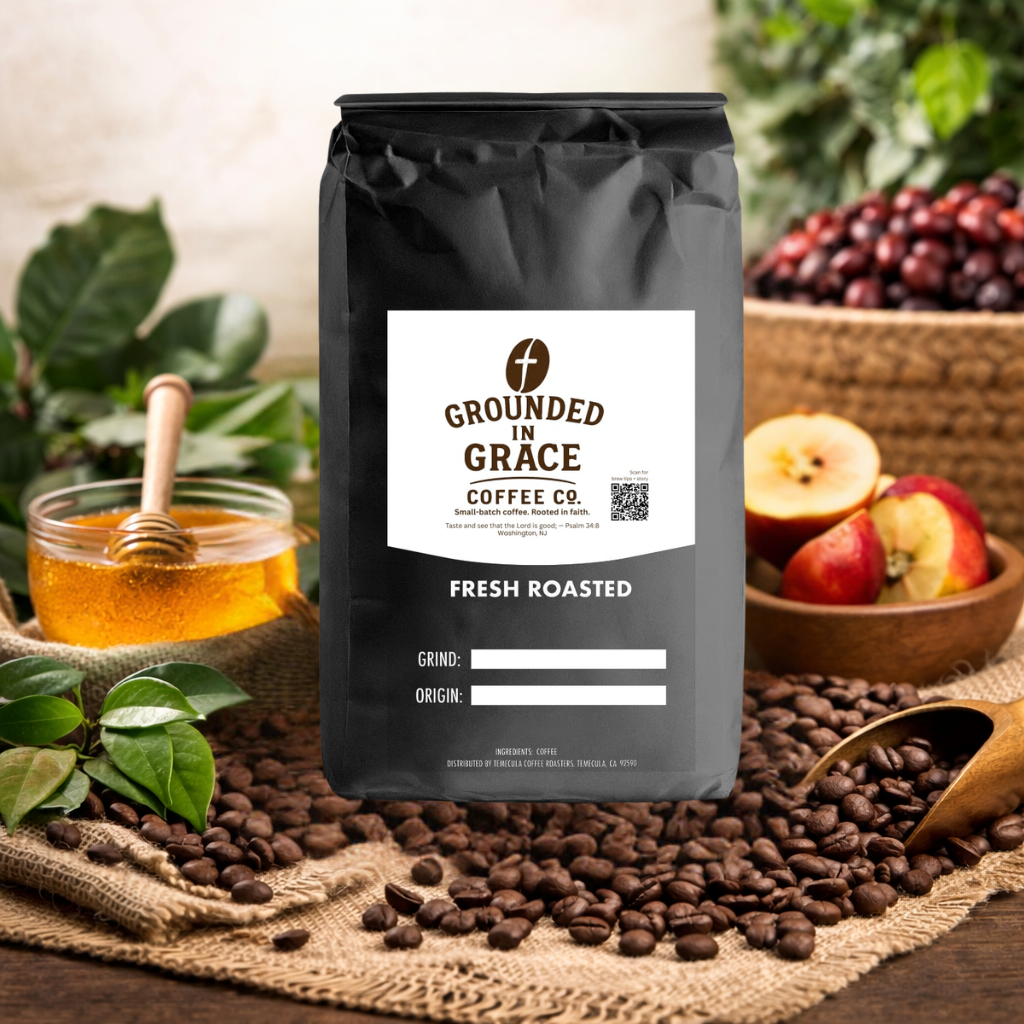 Grounded in Grace coffee bag with roasted coffee beans and honey on a wooden surface