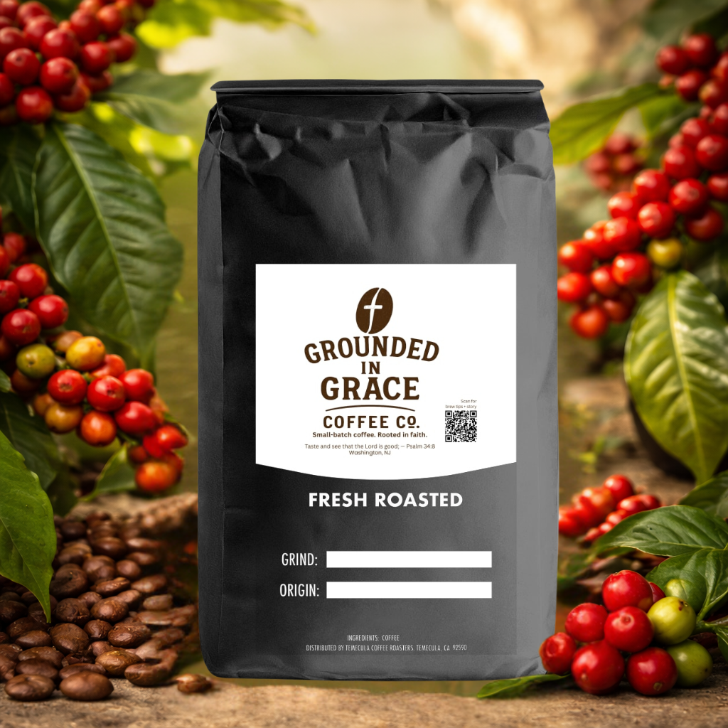 Grounded in Grace Coffee Co. bag with coffee beans and cherries in the background