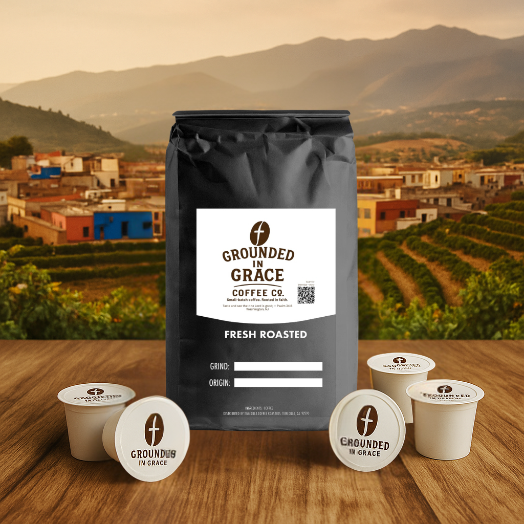 Grounded in Grace Coffee Co. package with coffee pods on a wooden surface with a scenic 
